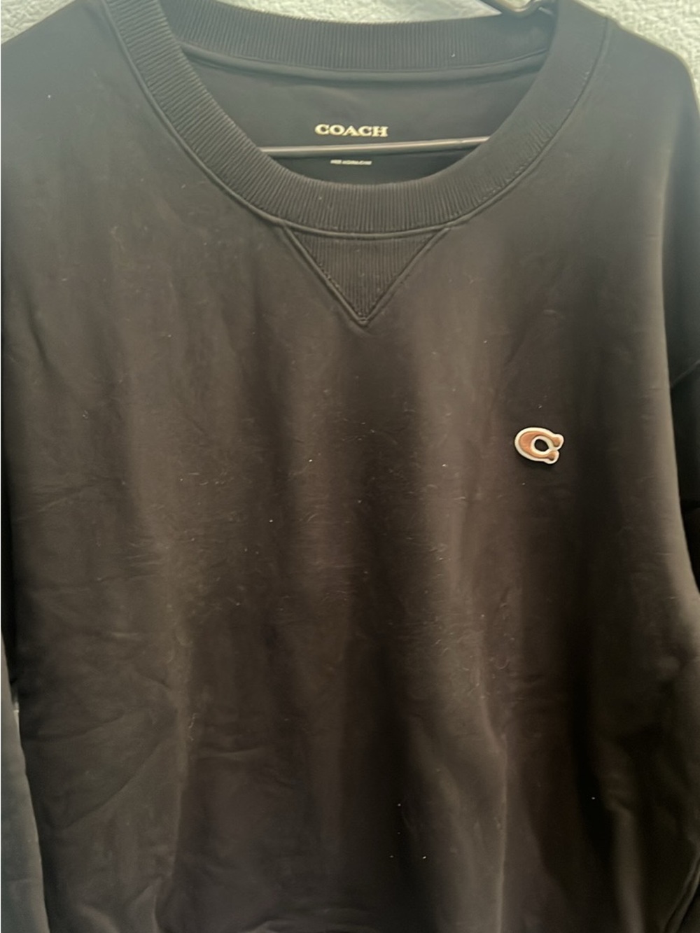 Coach Black Crewneck Sweatshirt with Tan 'C' Patch